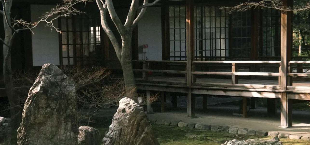 Tranquil Japanese Zen rock garden with stone lantern in Kyoto