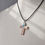 Thumbnail: Painted Ceramic Cross Necklace 