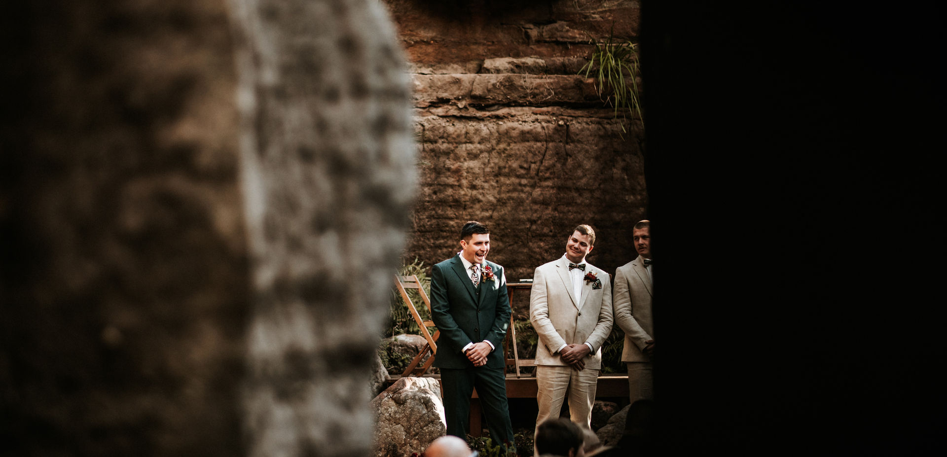 Groom and groomsmen waiting at the altar at The Rock Cathedral.