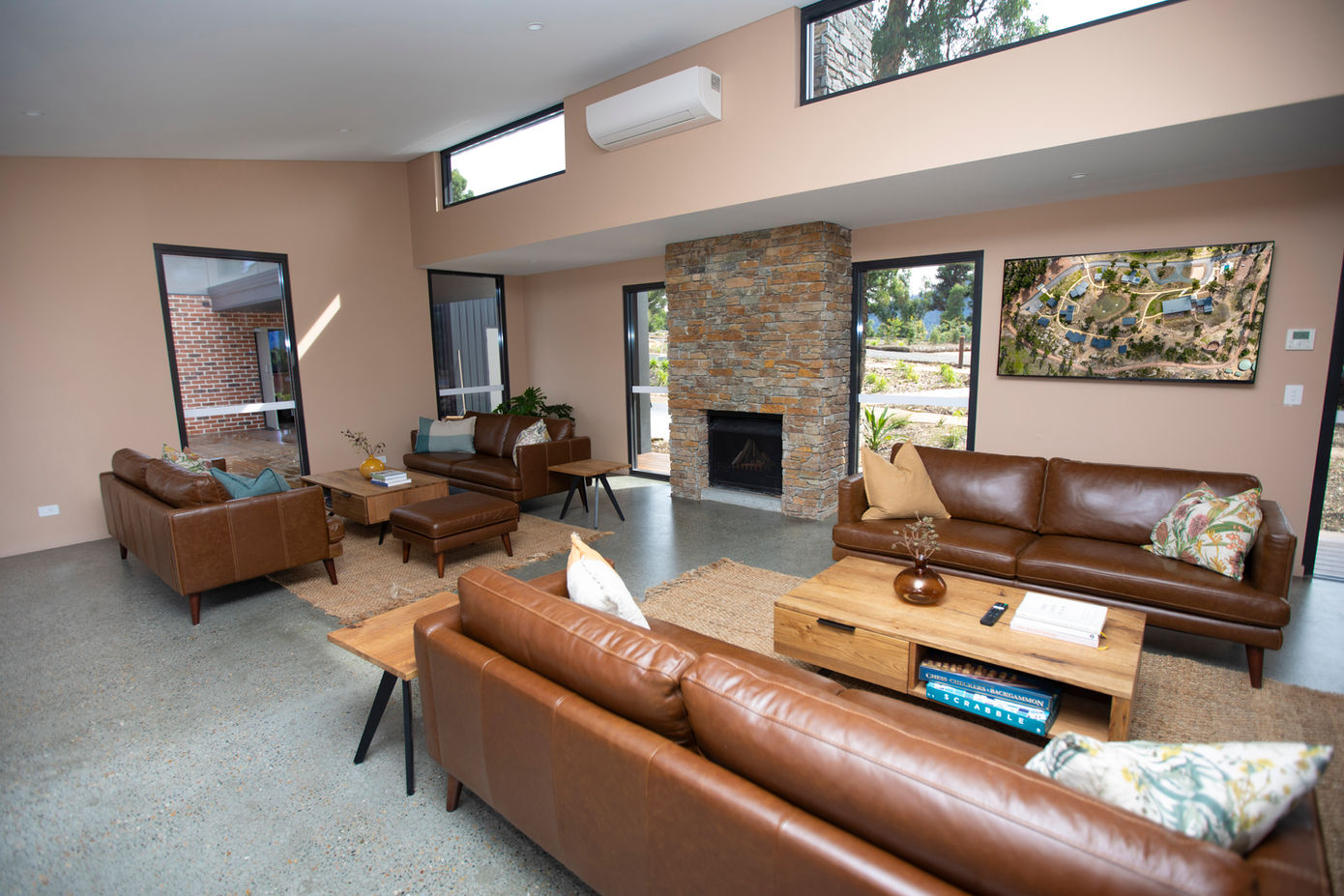 Leather sofas and large windows in KVBR guest lounge.