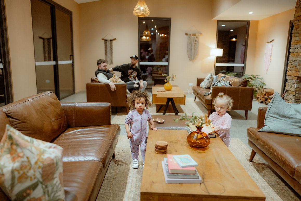 Guests with children in lounge area at KVBR.