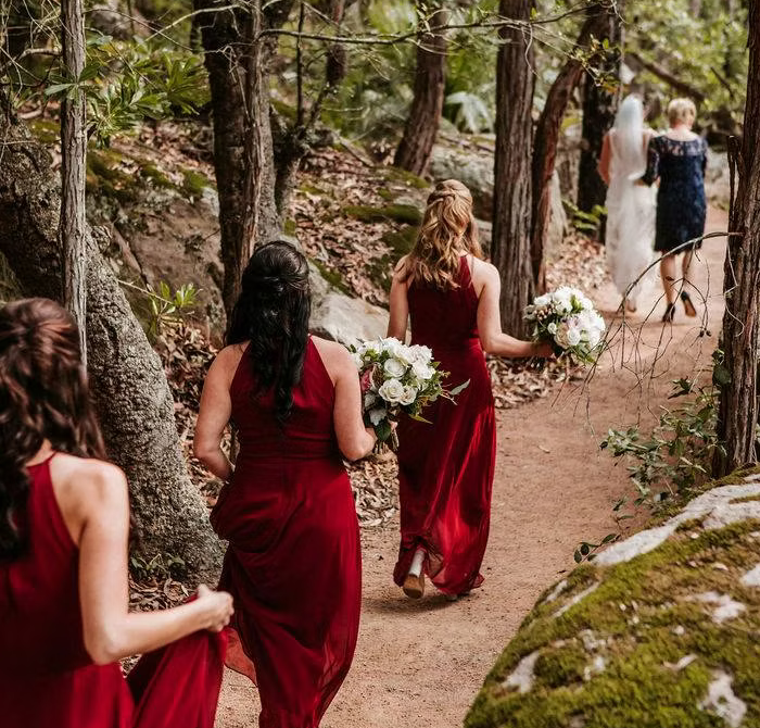 Bridal party walking through bush tracks at KVBR.