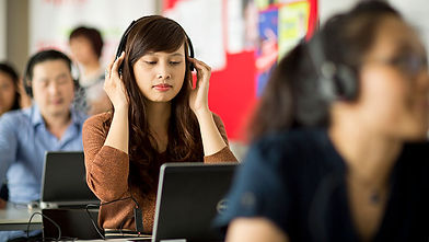 people-classroom-headphones-listening-skills.jpg