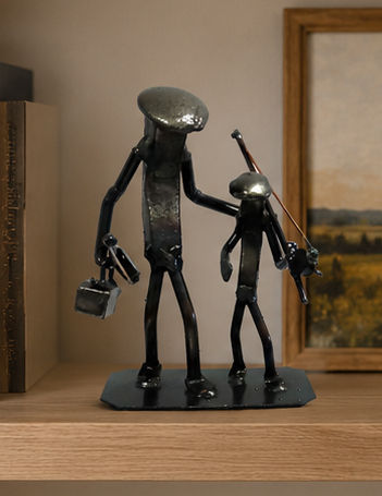 Fishing Memories - Metal Art Railroad Spike Sculpture on bookshelf