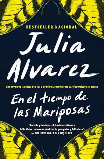 Blue book cover with yellow butterfly wings. Title: "En el tiempo de las Mariposas" by Julia Alvarez. National bestseller.