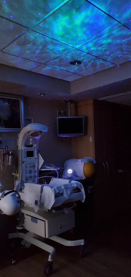 hospital room with blue and green galaxy lights