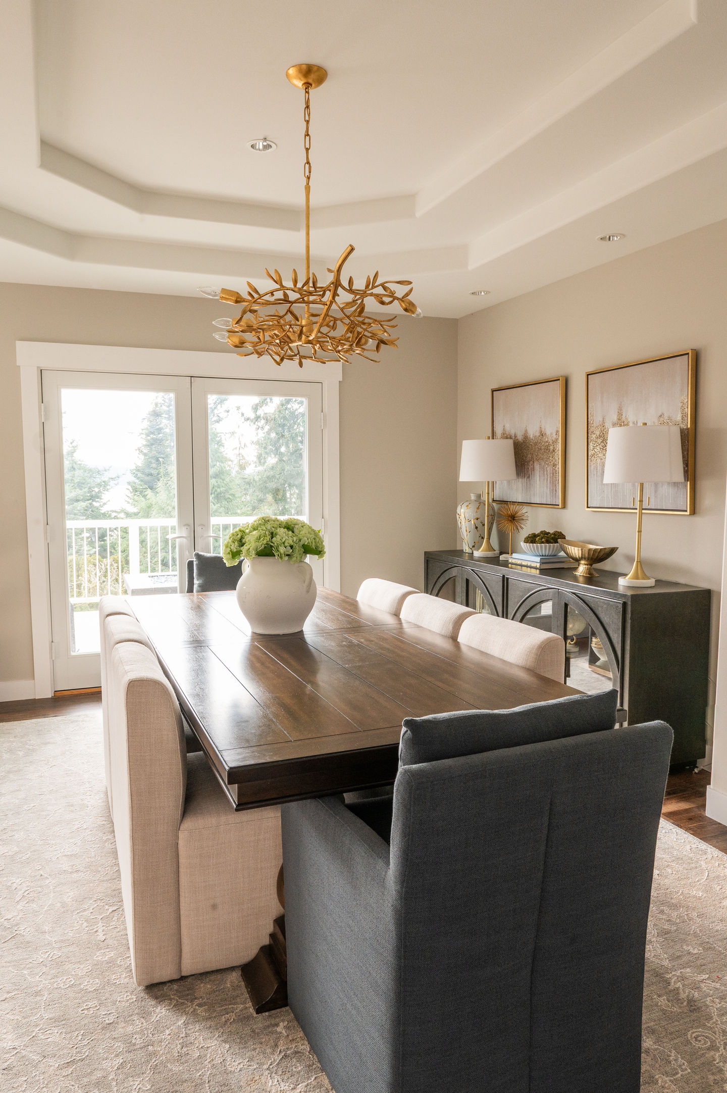 A formal blue, gold and cream dining room ready to host luxurious dinner parties.