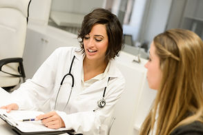 doctor-explaining-diagnosis-to-her-femal