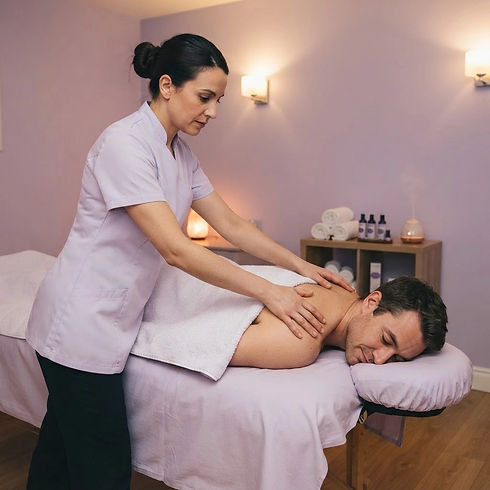 A massage woman dress in a nice uniform giving a back massage to a mail customer.jpg