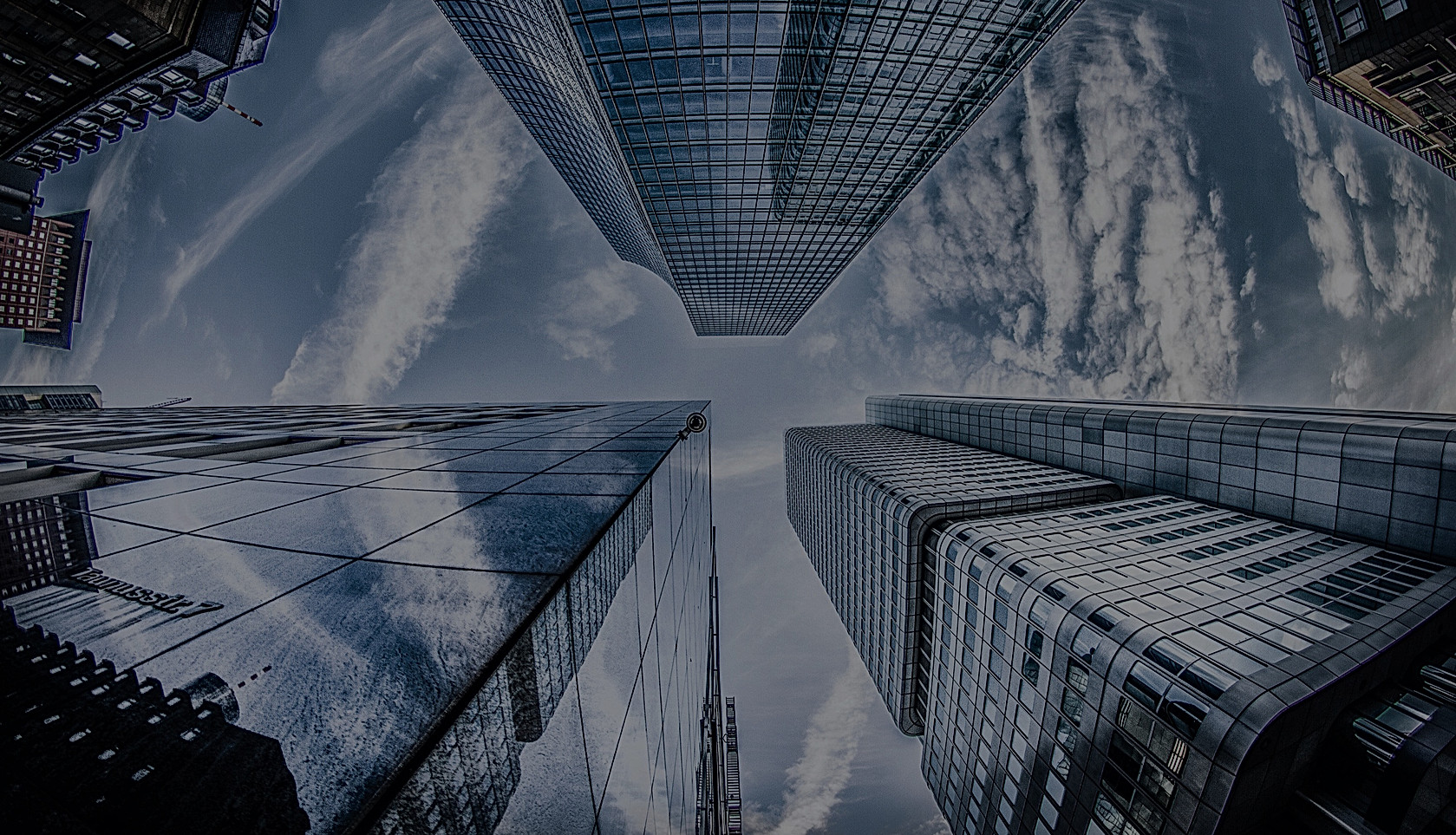low-angle-photo-of-four-high-rise-curtai