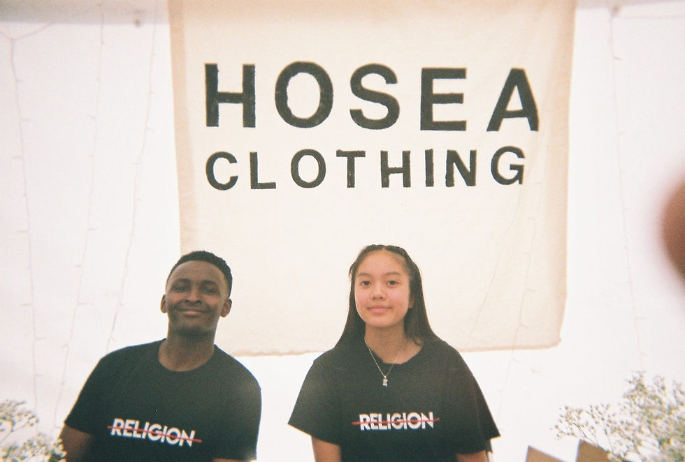 David and Hilda repping our Religion Relationship Tee