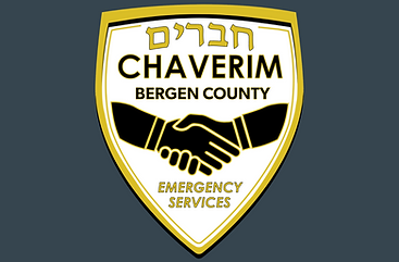 Chaverim of Bergen County is a volunteer-driven, non-profit organization that provides non-medical emergency assistance to residents throughout Bergen County, New Jersey. Operating 24/7, Chaverim—meaning “friends” in Hebrew—offers rapid-response support for a range of everyday crises that don’t require medical intervention. The organization is staffed by altruistic volunteers and dispatchers who are always on call to help community members in need.
The services offered by Chaverim encompass a variety of roadside and household emergencies. These include assistance with flat tires, car lockouts, dead batteries, and other vehicle-related issues. Additionally, they support community members during weather-related incidents and other urgent, non-medical situations. Their mission is to provide dependable, compassionate help in moments of stress, ensuring that residents have “friends they can count on” when unexpected problems arise.
Beyond emergency response, Chaverim actively engages in community safety initiatives. For example, they promote the use of safety reflectors to enhance pedestrian visibility, particularly during low-light conditions. The organization also celebrates milestones like the unveiling of new service vehicles, highlighting their commitment to expanding and improving their capabilities. These efforts underscore Chaverim’s broader goal of fostering a safer, more connected community through proactive service and outreach.
Chaverim of Bergen County exemplifies the role of a community-based organization (CBO) by addressing local needs through volunteerism and grassroots support. Their model emphasizes immediate, practical assistance, reinforcing community resilience and solidarity. By bridging gaps in emergency services, Chaverim not only aids individuals in distress but also strengthens the social fabric of Bergen County, embodying the spirit of neighborly care and mutual aid.
