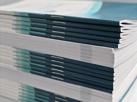 print booklet stacks saddle stitched production