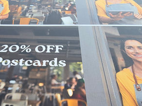 Postcards and flyers representing neighbourhood direct mail marketing for local businesses