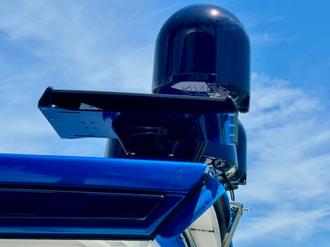 Custom blue Starlink maritime dish mounted on boat for offshore high-speed internet