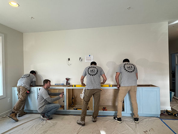 Frederick Carpentry custom built-in blue bookcase cabinets drawers.jpg