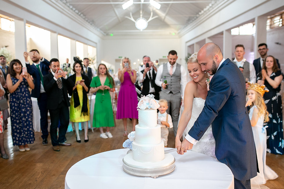Blue and peach wedding cake.jpeg