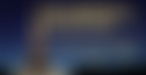 Eiffel Tower glowing gold on a black background, symbolizing the historic inclusion of women’s names after 135 years.