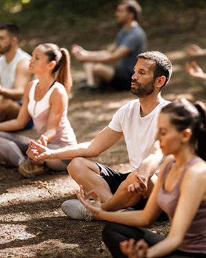 Group yoga session in a serene mountain setting at our North Georgia wellness retreat center.