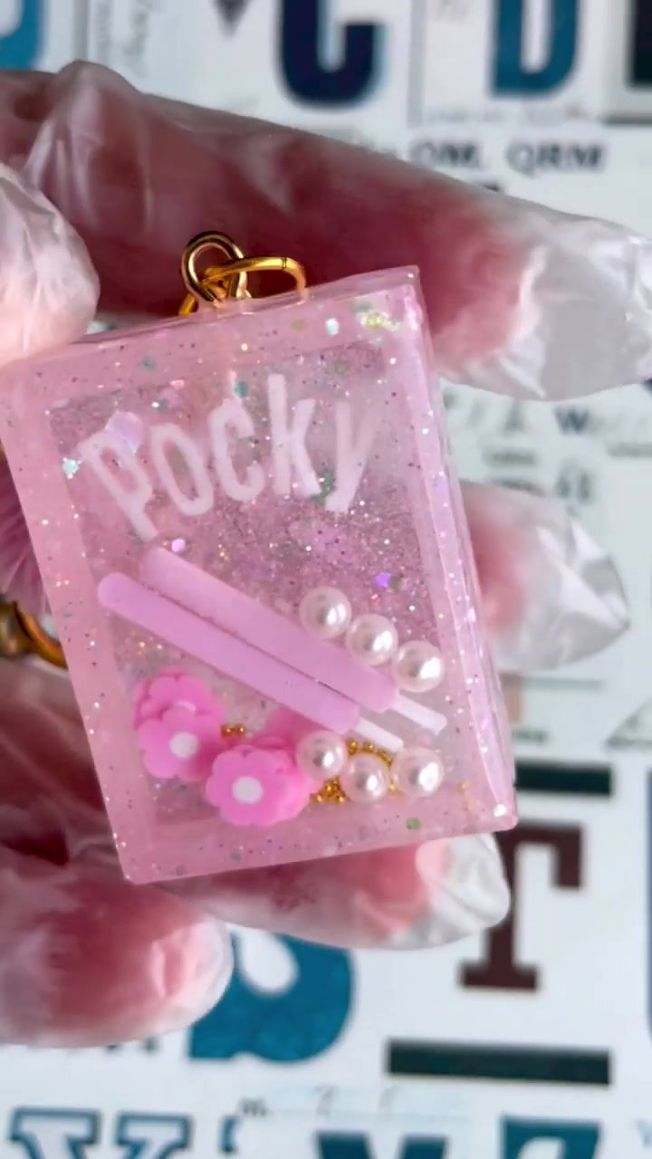 Thumbnail: Kawaii Grip Size Pink Pocky Liquid Shaker Charm Keychain
