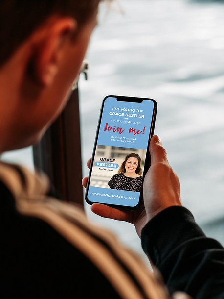 Man Holding iPhone Mockup.png
