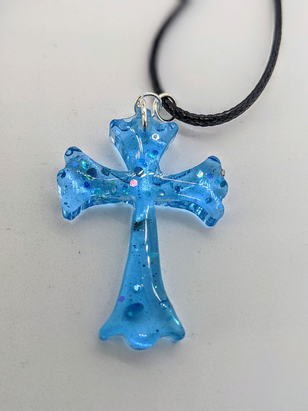 Thumbnail: Blue Glitter Cross Necklace