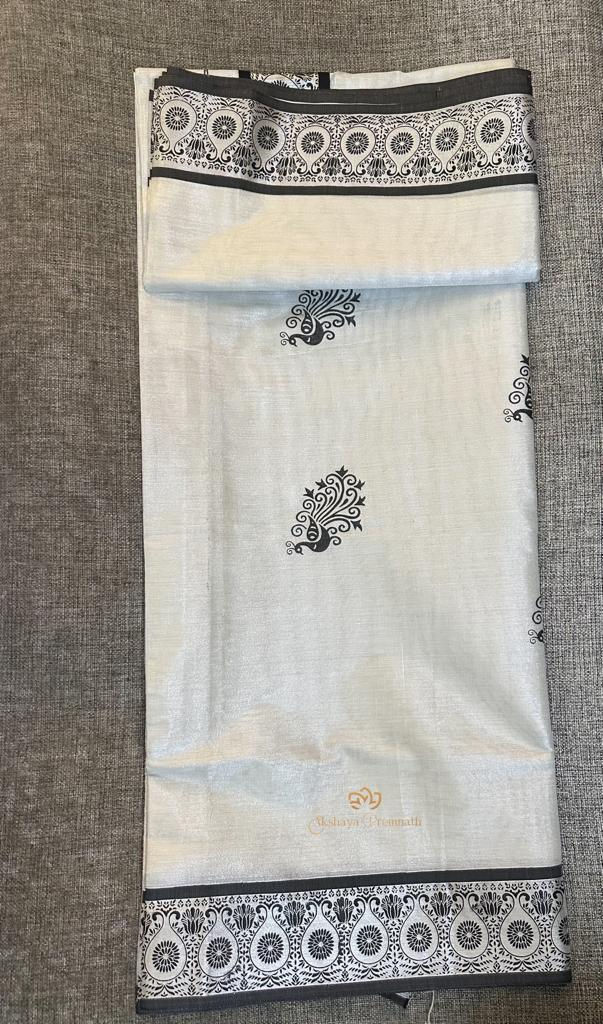 Thumbnail: Silver tissue saree with peacock design 