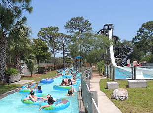 Students floating on tubes down the lazy river at Shipwreck Island Waterpark