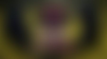 Illustrated jungle-noir scene featuring two hooded operatives standing on either side of a glowing emblem for The E.V.E Directive. The figure on the left wears a dark feathered cloak, while the figure on the right wears a hood and red-framed glasses. Between them, a luminous gold-and-purple insignia with a stylised feminine face and circuitry motif hovers above the title “THE EVE DIRECTIVE.” Below, bold neon text reads “JOINT REPORT // SPECIAL AGENTS GEORGIE F. & AUBREY R. //.” The background is filled with green mist and dense jungle foliage, creating a mysterious, covert intelligence atmosphere.