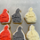 Thumbnail: six 2cm Firemen cookies, bright red, dark grey and soft yellow