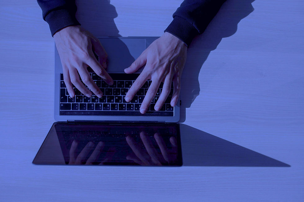 developer coding on a laptop