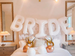 Miami bachelorette party décor featuring BRIDE balloon setup and ring balloons