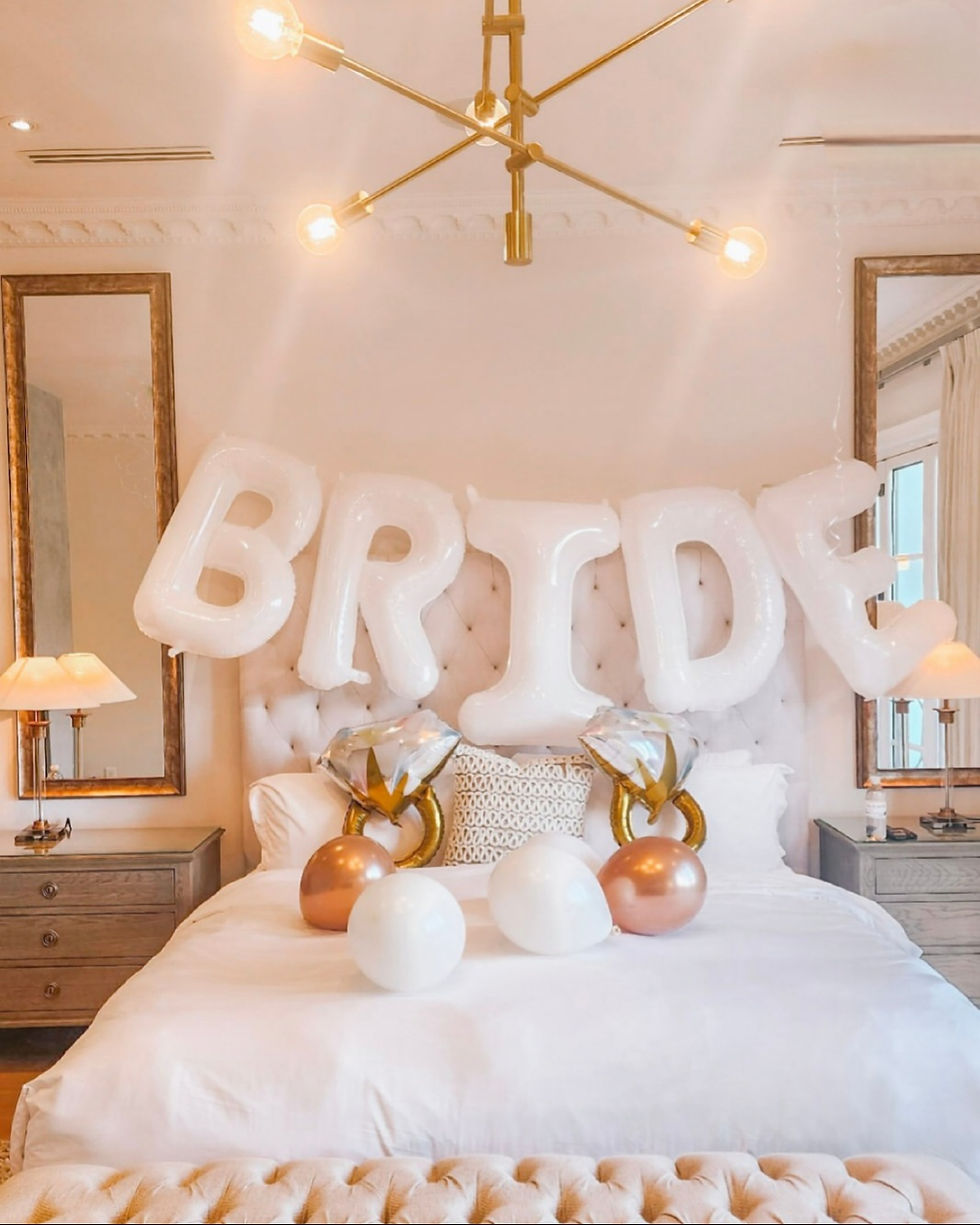 Miami bachelorette party décor featuring BRIDE balloon setup and ring balloons