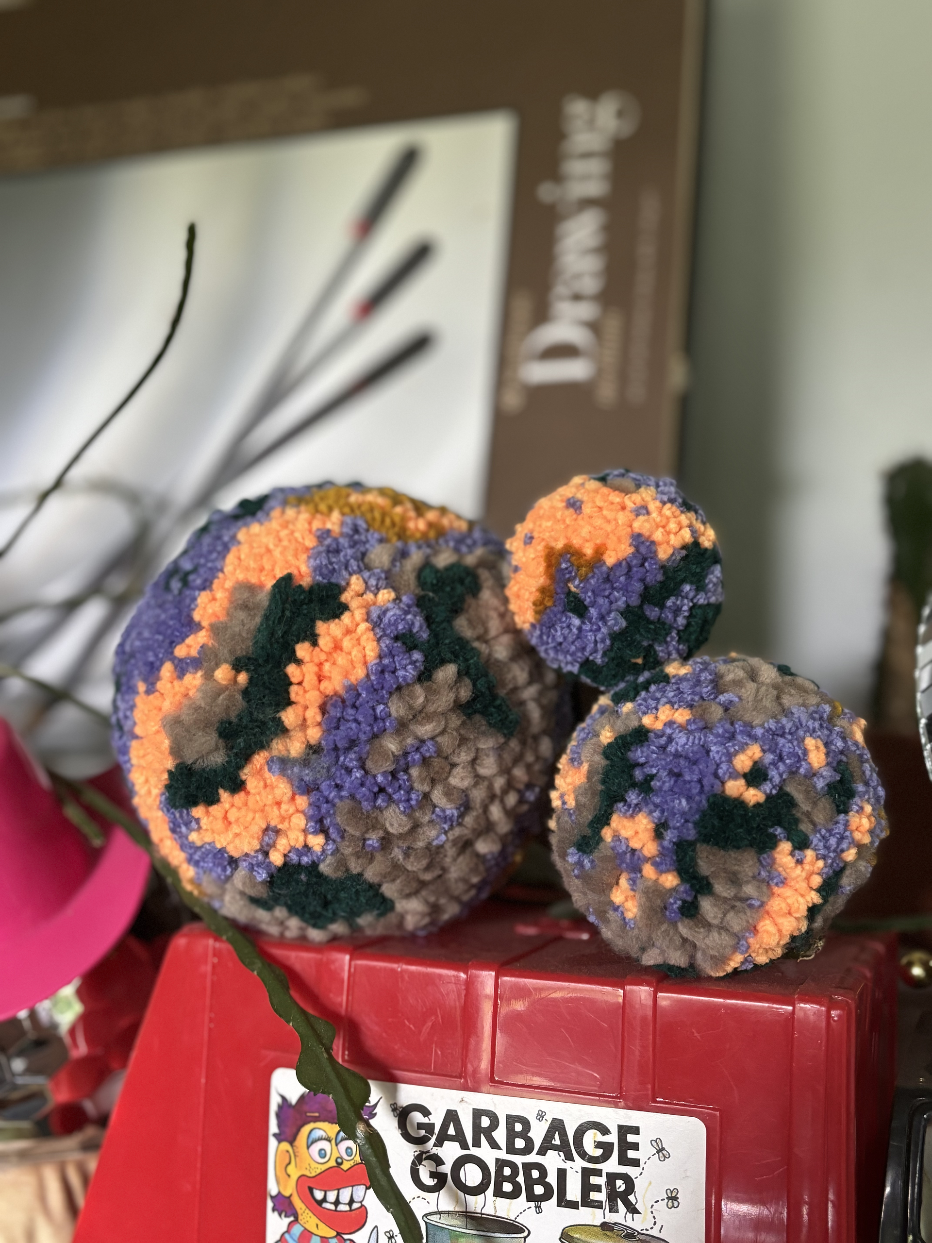 poms on a shelf @wiggle.stuff
