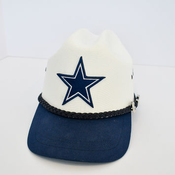 Dallas Cowboys cowboy cap with white crown, blue ball cap brim, and embroidered star logo.