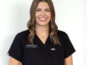 Medical aesthetician Breck reviewing skin treatments at Horizon Med Spa in Kansas City