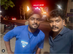 Instagram Creator Vignesh Chandran in a dark blue shirt with Actor Manikandan in a dark blue shirt in a thalluvandi shop having dinner.