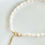 Thumbnail: Un bracelet de cheville composé de petites perles d'eau douce offre un look délicat et féminin, parfait pour l'été. Les perles d'eau douce apportent une touche de sophistication naturelle, tandis que la taille réduite des perles crée une esthétique subtile et discrète. Ce bracelet de cheville est idéal pour ajouter une touche de style à vos tenues estivales, que ce soit pour une journée à la plage ou pour une soirée en ville. Son design intemporel en fait un accessoire polyvalent qui complétera parfaitement votre look estival.





