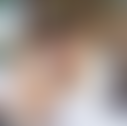 A woman hugs her dog.