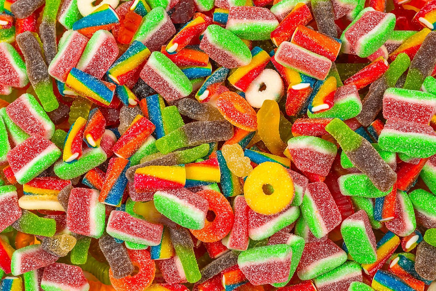 assorted-gummy-candies-top-view-jelly-sweets-background_188078-21102.jpg