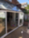 French doors leading onto a decked patio