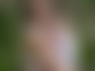 Mother holding her baby, reflecting on motherhood and personal growth after having a baby. Concept of matrescence and transformation