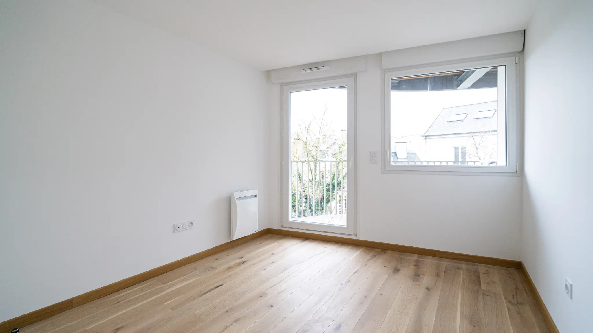 Pièce lumineuse et vide de l'appartement T4 neuf de la Résidence 1787 à Reims Boulingrin