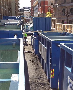 Containers for sedimentation of particles in water