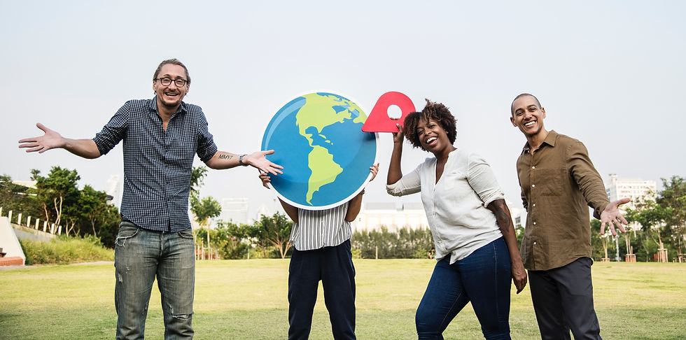 Team holding a globe, representing Go-Elite Retreats' global corporate retreat services in Colombia, Greece, Serbia, Croatia, North Macedonia, Albania, and major U.S. cities.