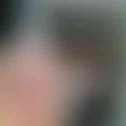 Me on The Back Porch taking a selfie with Brian in the reflected patio door glass