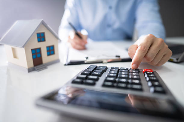 Mark Fornal reviewing financial reports for residential and commercial properties at LPMG Management