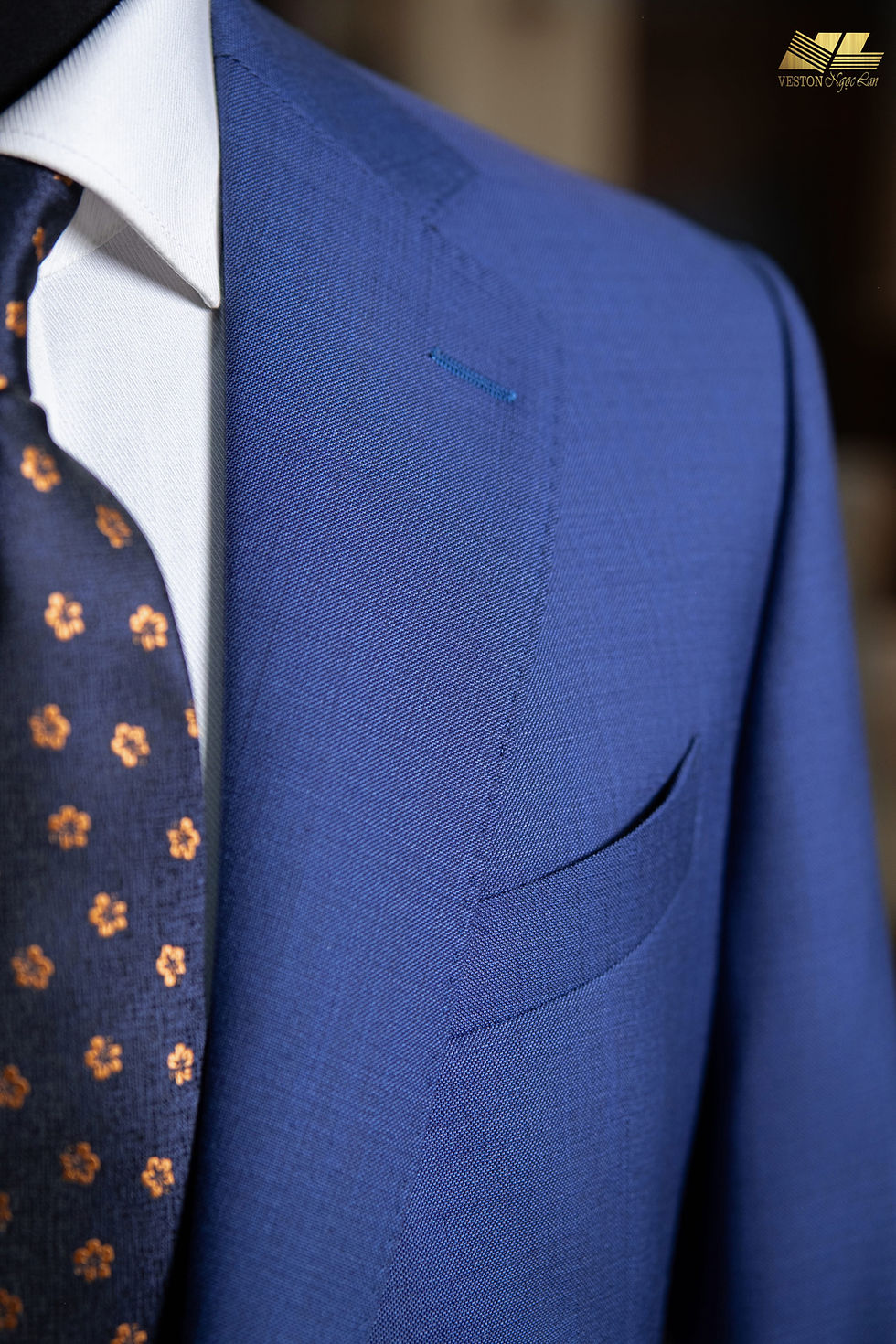Details of the Tailored Navy Suit by Veston Ngoc Lan. Soft, smooth fabric, youthful shape