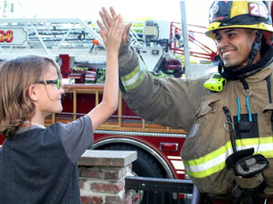 Andy becomes a sworn firefighter