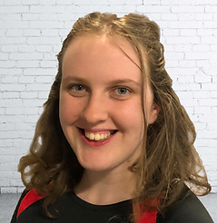 Head and shoulders photo of smiling woman called Rose with long light brown hair.